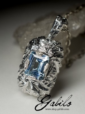 Silver pendant with topaz