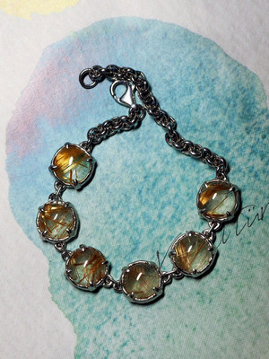 Rutilated quartz silver bracelet 