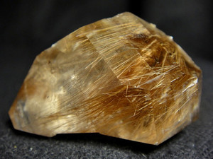 Rutilated quartz mineral specimen 