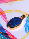Men's black opal gold pendant