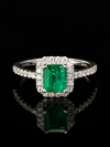 Emerald gold ring with diamonds with jewellery report