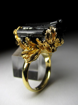 Gold ing with crystals of black tourmaline