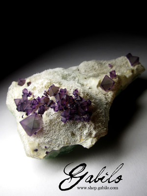 Violet fluorite on the rock