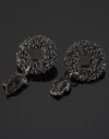 Ohrringe mit Meteoriten auf Stahlelementen