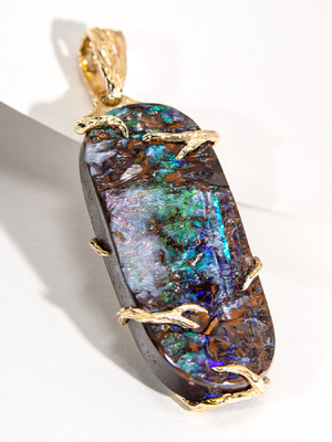 Boulder opal yellow gold pendant