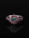 Dark opal gold ring with pink sapphires