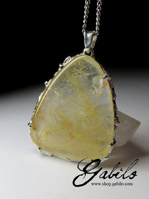 Silver pendant with rutilated quartz