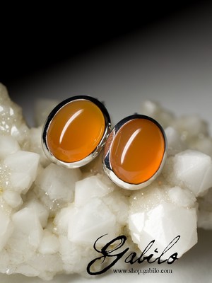 Silver stud earrings with carnelian
