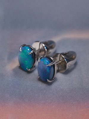 Silver earrings with black opals