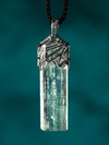 Aquamarine crystal white gold pendant