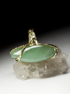 Gold ring with cat's eye jade