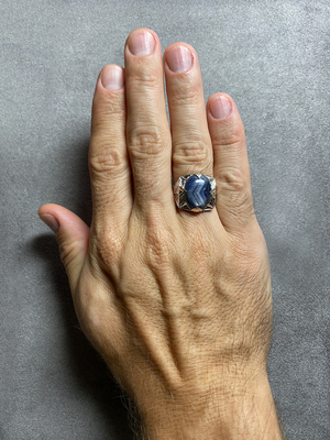Large gold ring with blue sapphire 