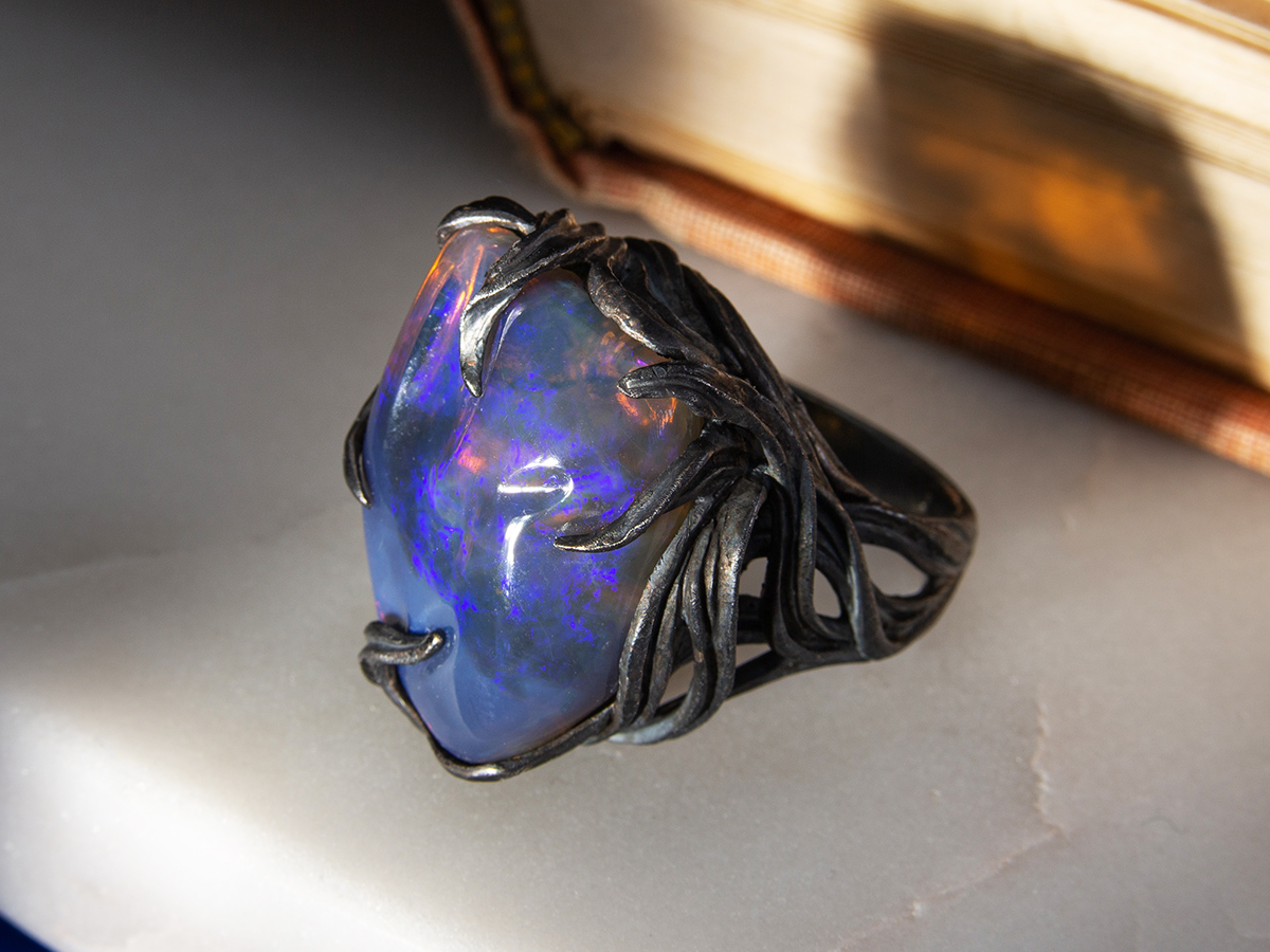 neon blue opal silver ring
