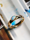 Opal gold ring with Jewelry Report MSU